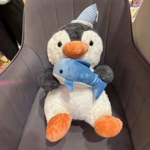 Penguin Holding Fish Plush